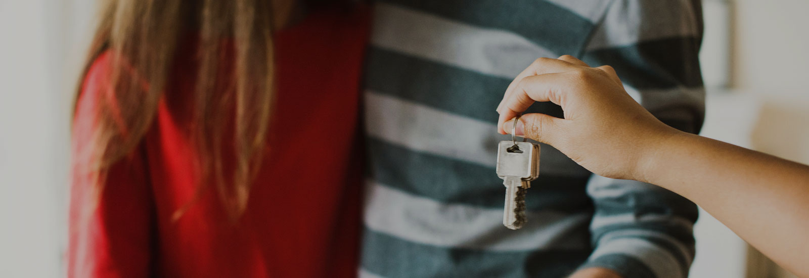 Photo of someone holding a set of house keys